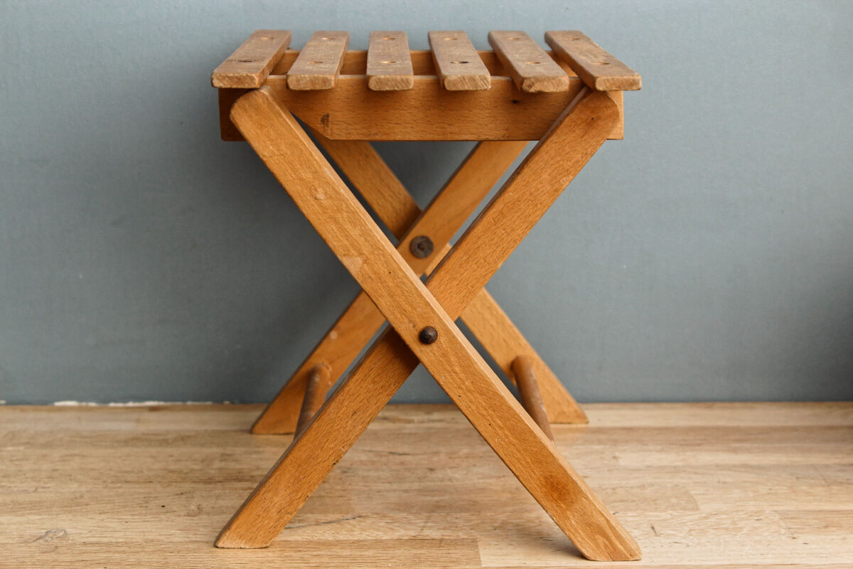 Lathy folding stool made of wood