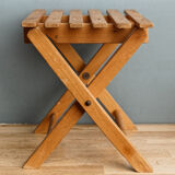 Lathy folding stool made of wood
