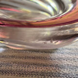 Empty pocket in pink tinted glass