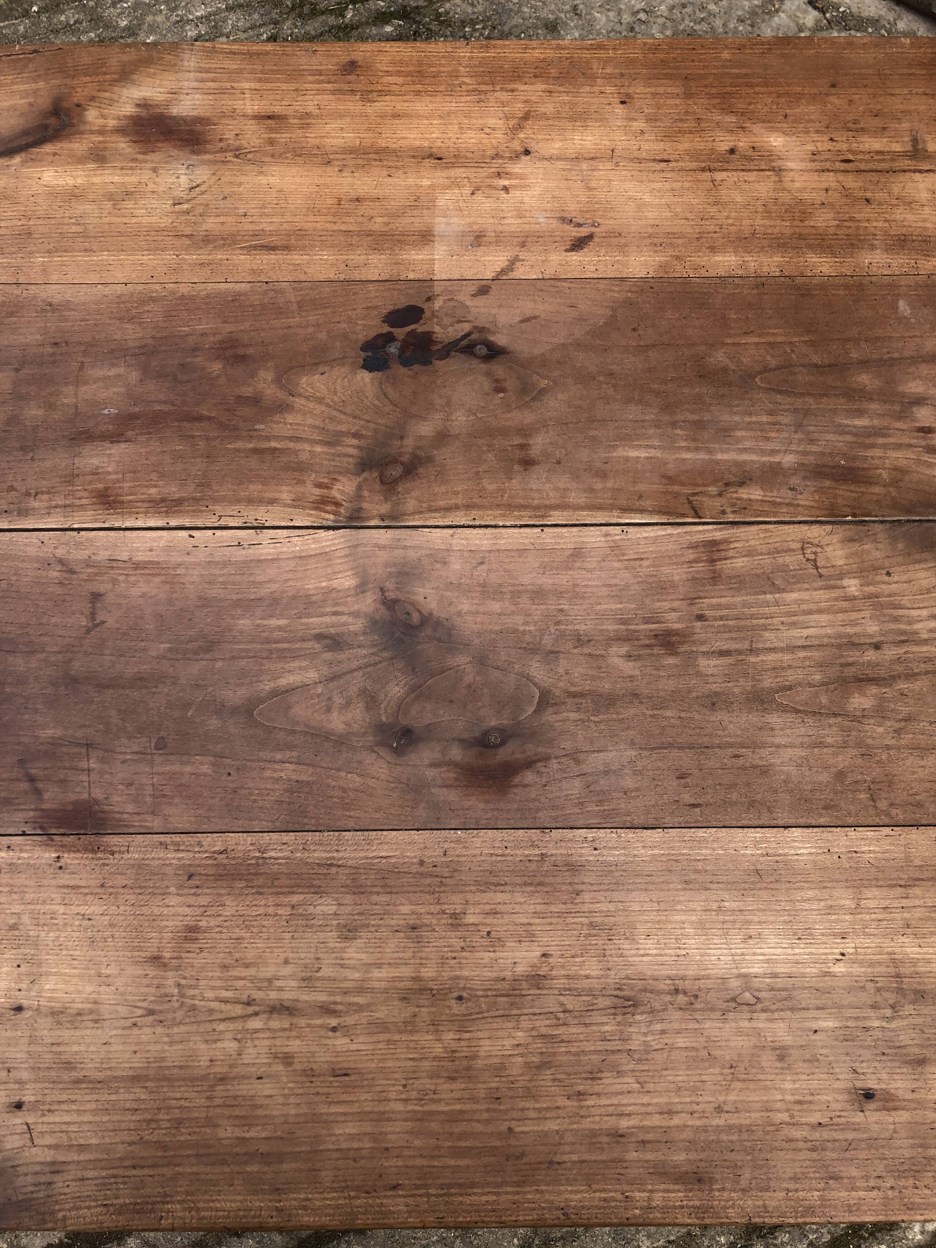 Antique cherry farmhouse table with 2 drawers and 1 pull-out