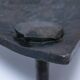 Brutalist metal pocket with patinated tripod