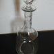Hand-cut glass decanter, faceted glass cap
