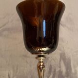 Tinted glass photophore on high metal foot with silver patina