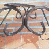 Wrought iron plant holders