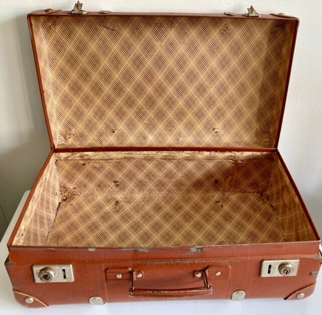 Small old brown suitcase
