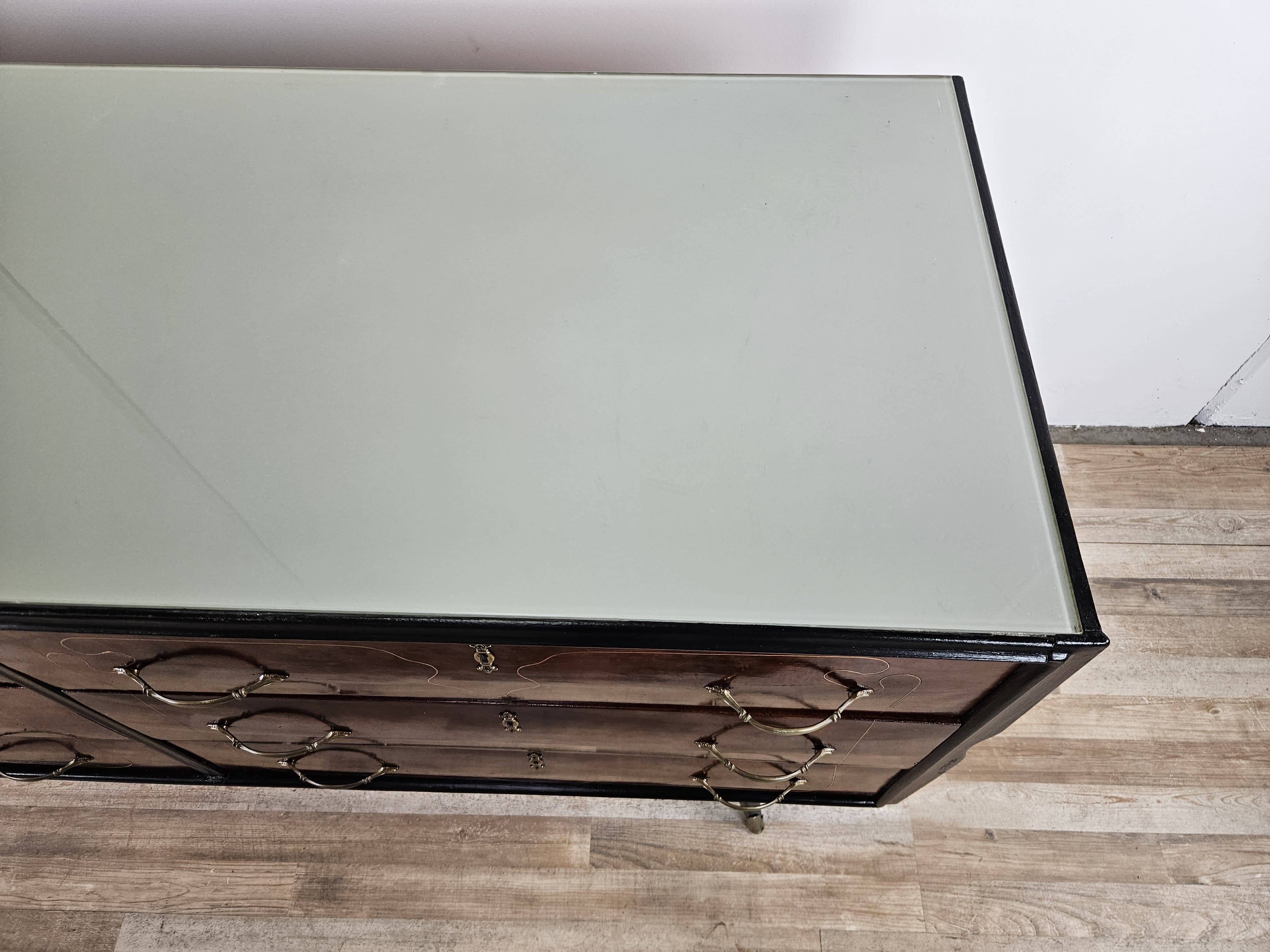 1960s chest of drawers in mahogany and lacquered mahogany with blue glass