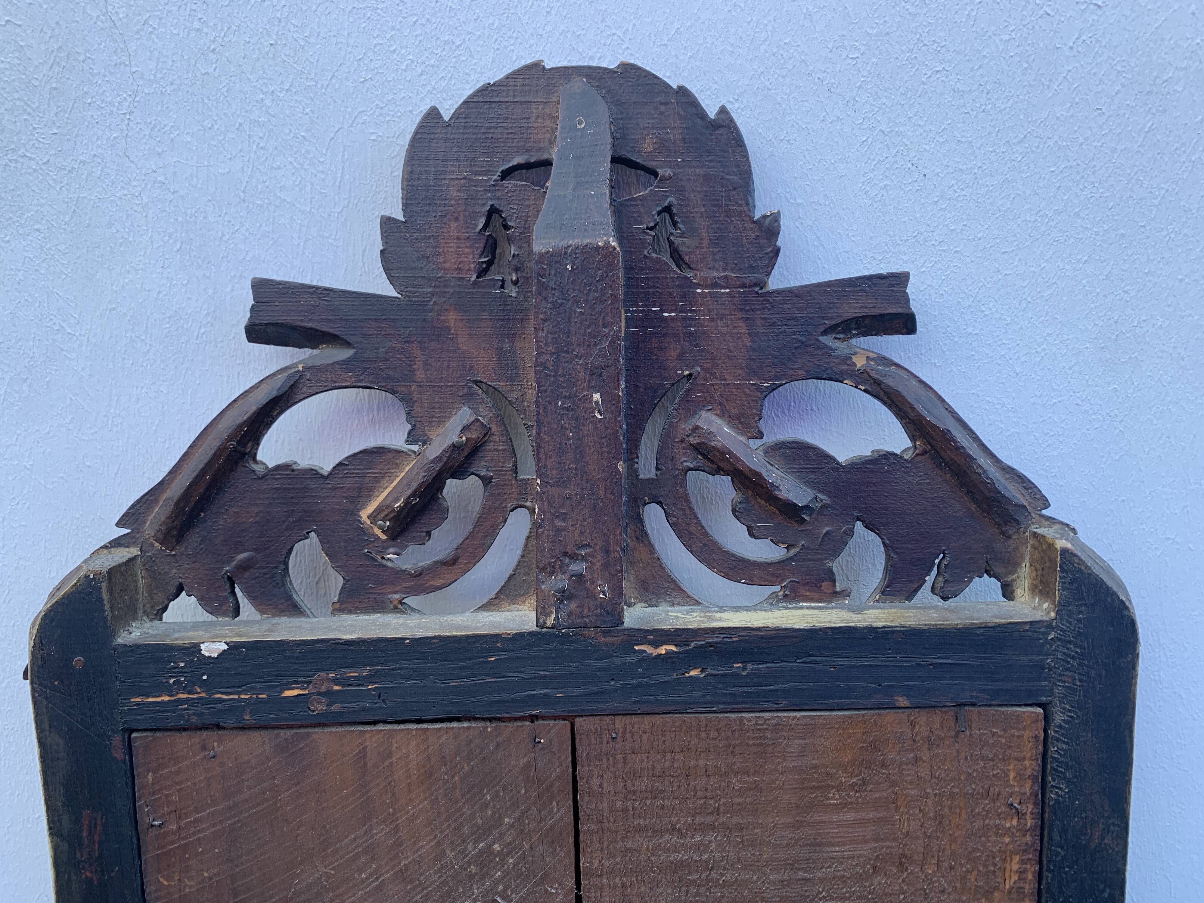 Antique mirror with gilded wood pediment, Louis XVI style