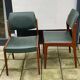 Pair of Scandinavian Teak and leatherette Chairs