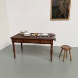 Walnut and pine drapery farmhouse table
