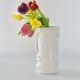 White glazed ceramic vase with face
