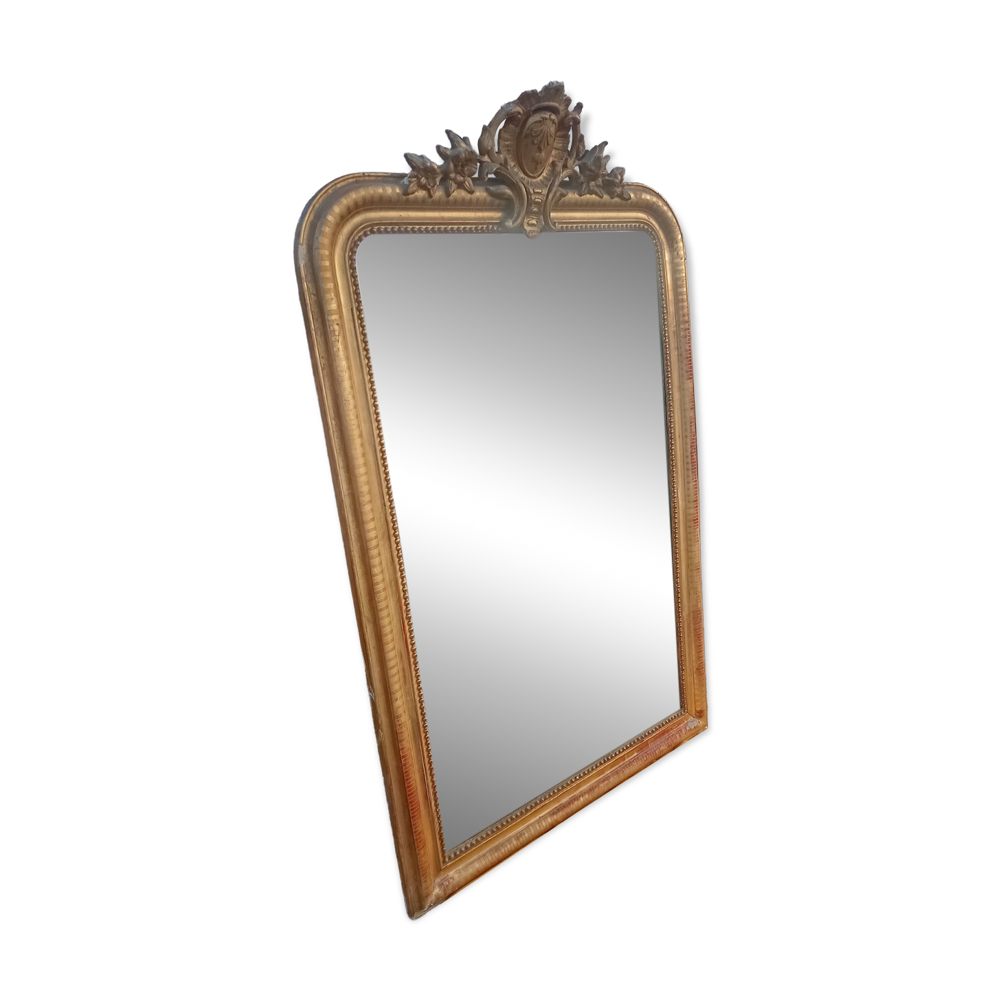 Antique Louis Philippe mirror gilded with gold leaf.