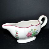 Lunéville KG earthenware sauce boat with polychrome painted flowers, revolving lamp.