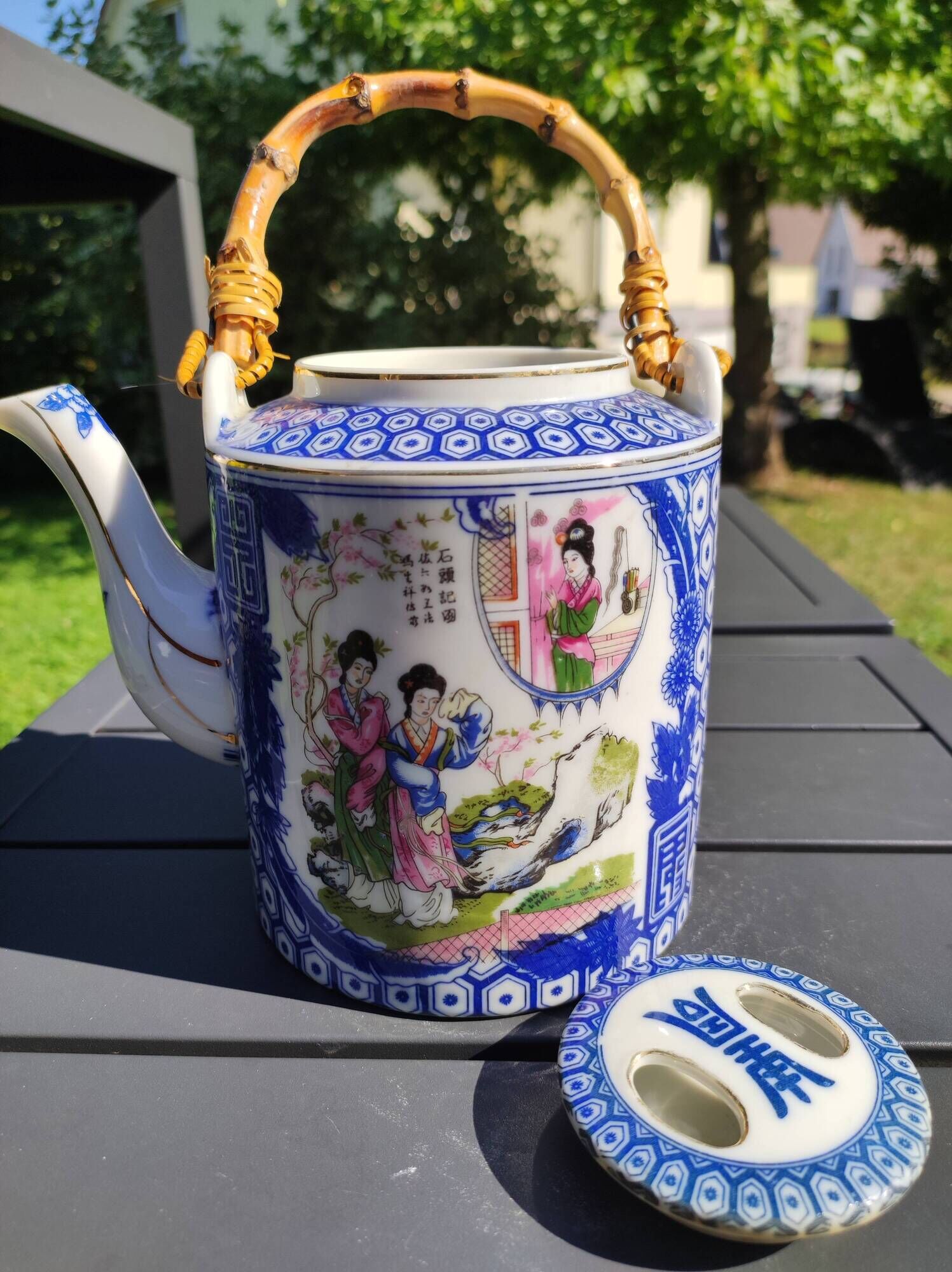 Asian, Japanese fine porcelain teapot with woven bamboo handle, vintage 50s