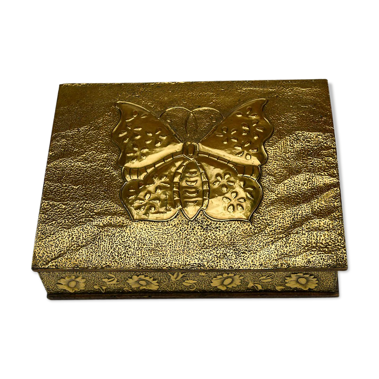 Old wooden box decorated with carved gold metal repelled vintage butterfly