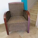 2 armchairs in woven rattan and wood, 1980s