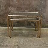 Pair of nesting coffee tables in gold metal with bamboo effect