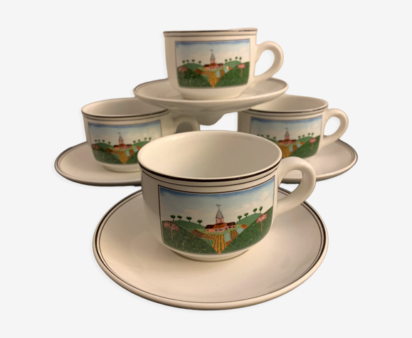 Lot de 4 tasses et 4 sous tasses signées Villeroy et Boch, modèle naïf de Gérard Laplau