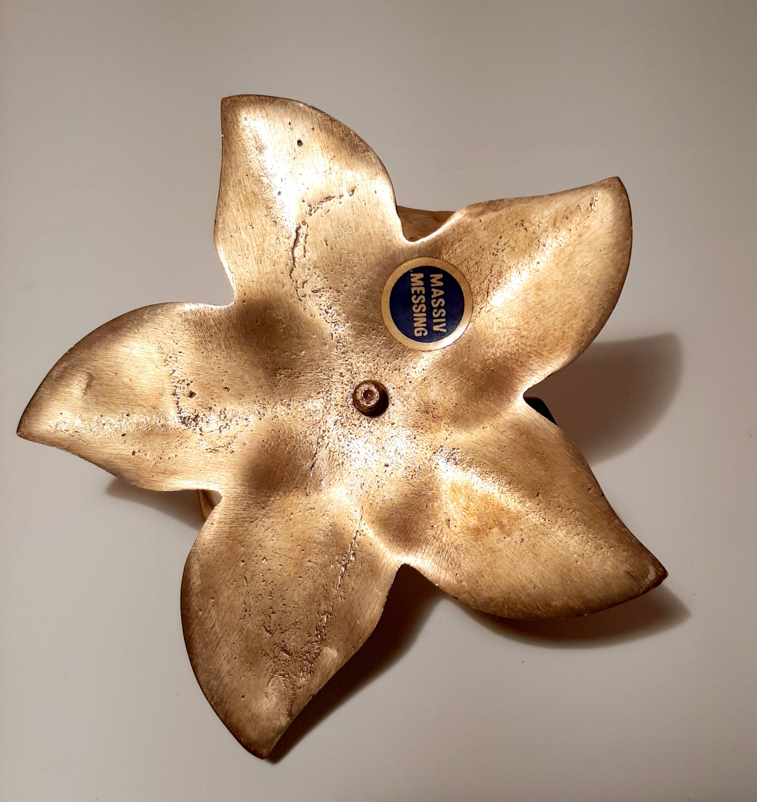 Golden brass flower candle holder