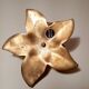 Golden brass flower candle holder