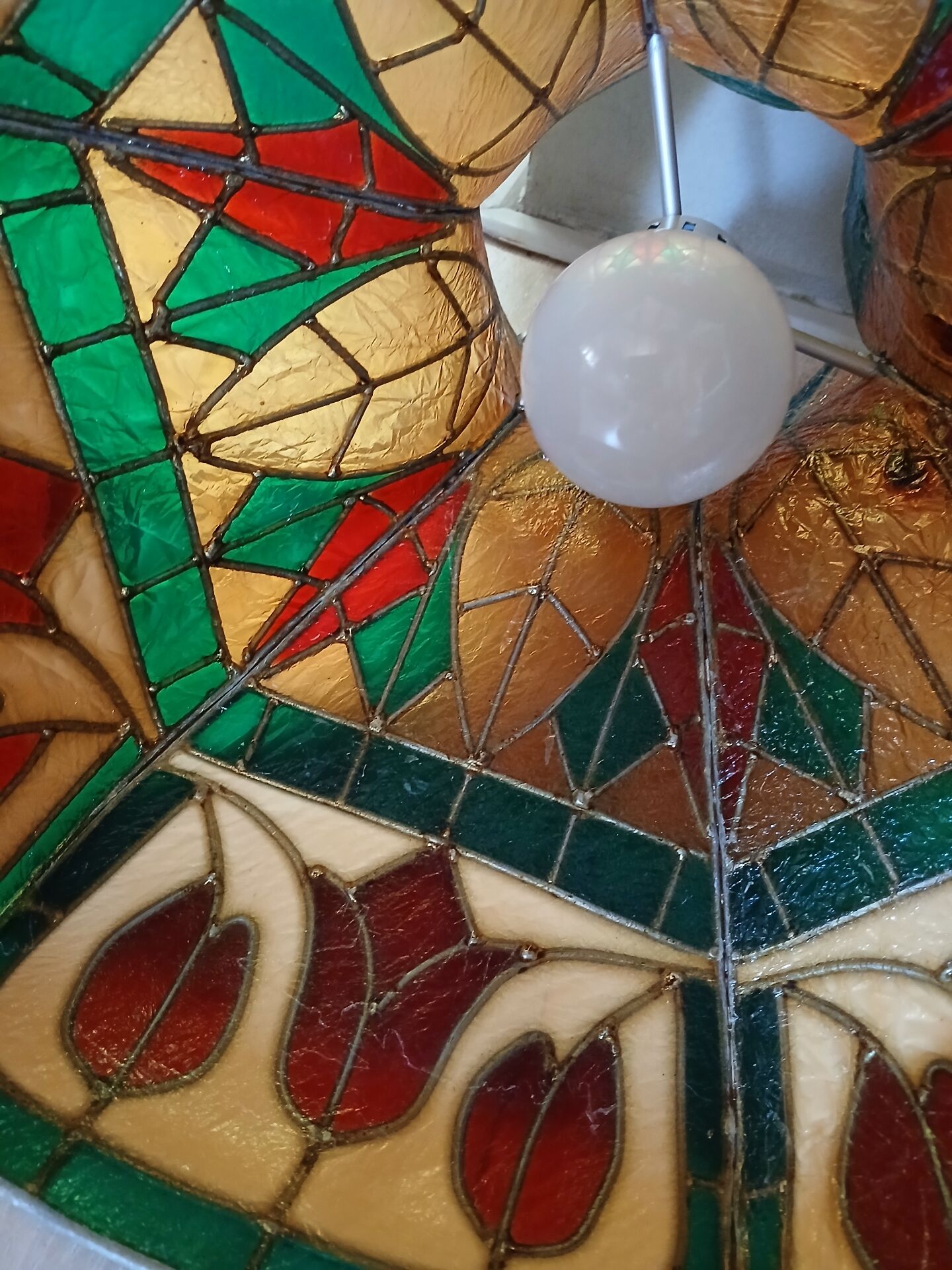 Vintage pendant light with multicoloured stained glass.