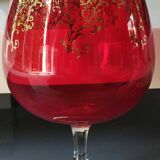 Vase in the shape of a footed cup, in bohemian crystal. ruby color. scroll & floral design with 24 c gold highlights