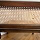 Vintage wooden and cane armchair