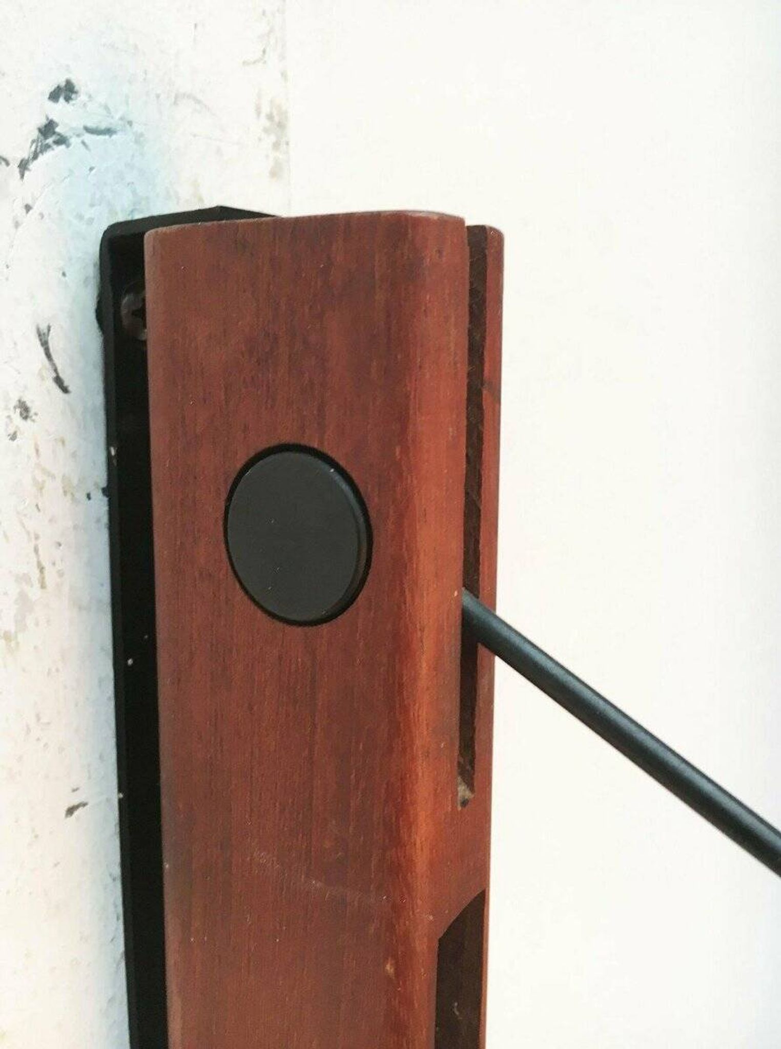 Mid-century pivoting wall lamp with a swing arm, Cocoon, made of teak wood, 1960s.