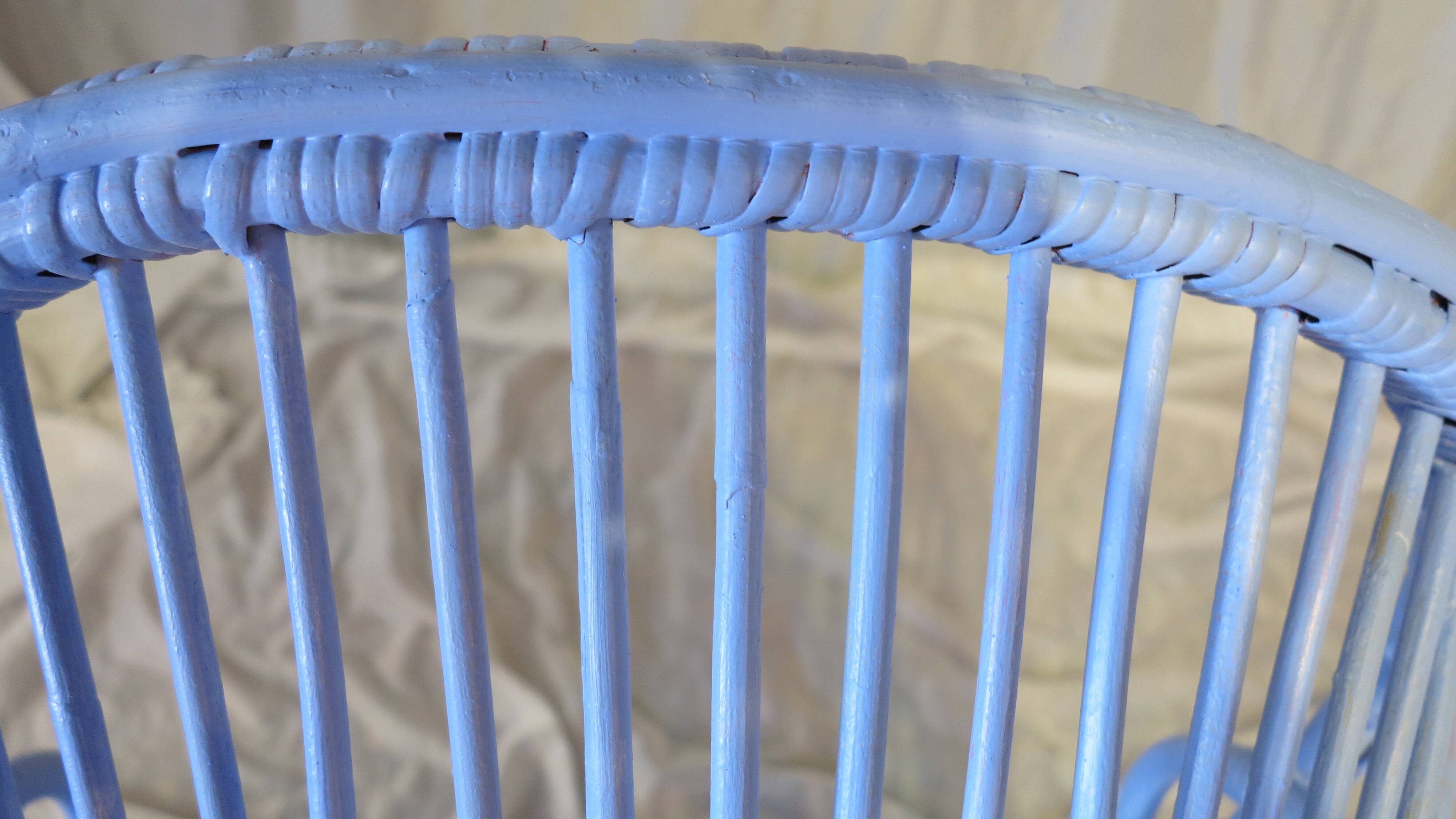 Blue painted rattan armchair