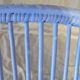 Blue painted rattan armchair