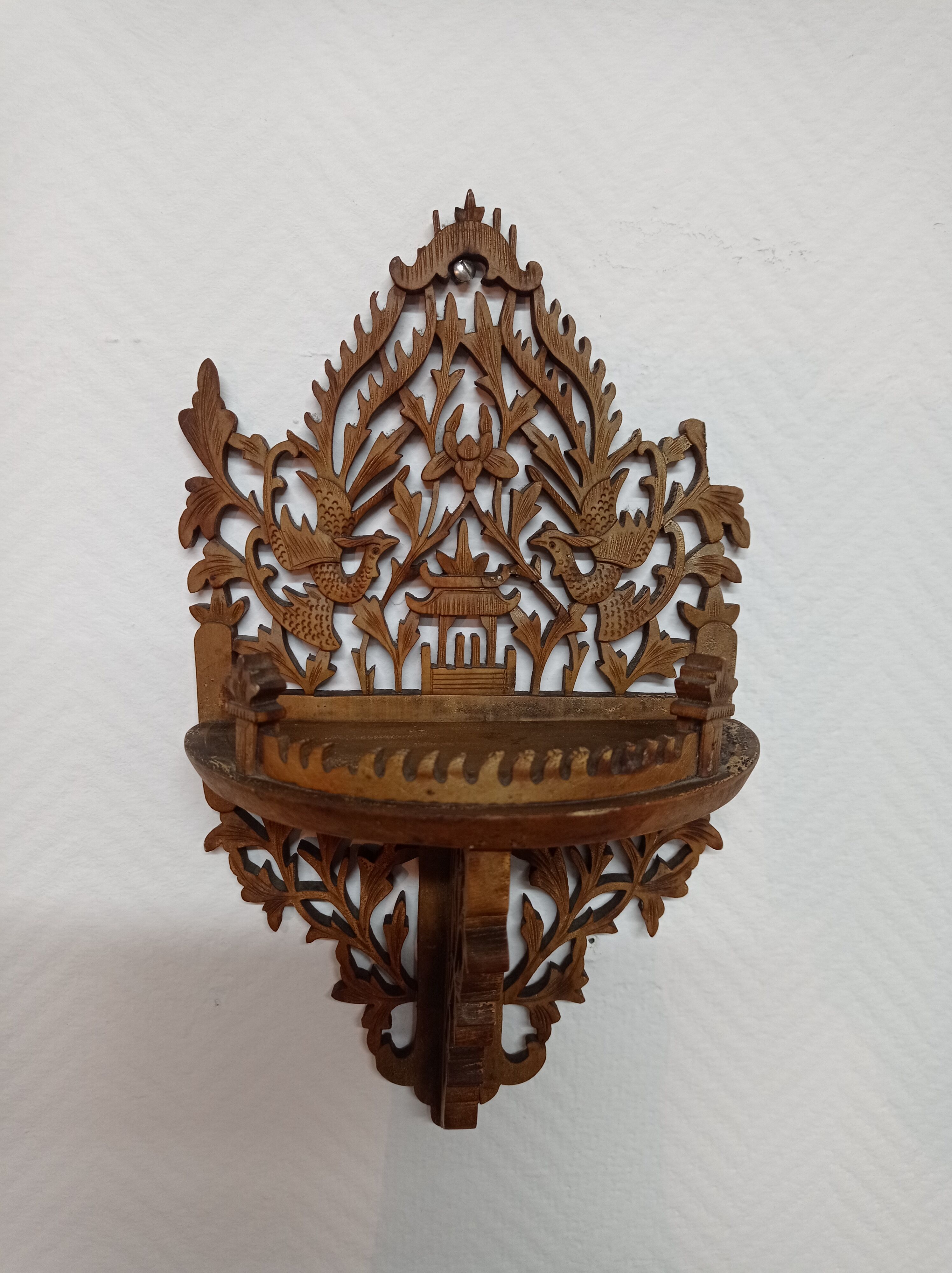 Small wooden wall shelf