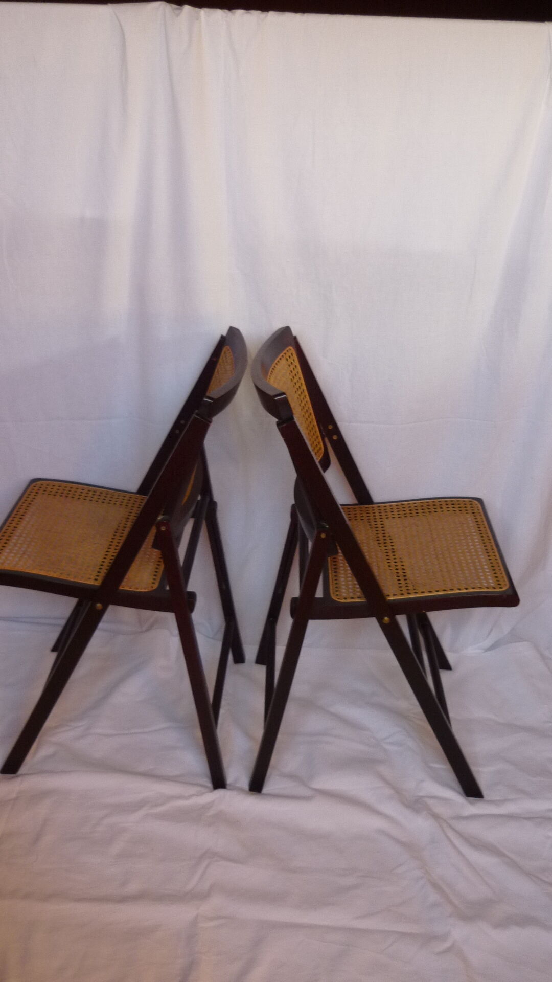 Duo of canned folding chairs