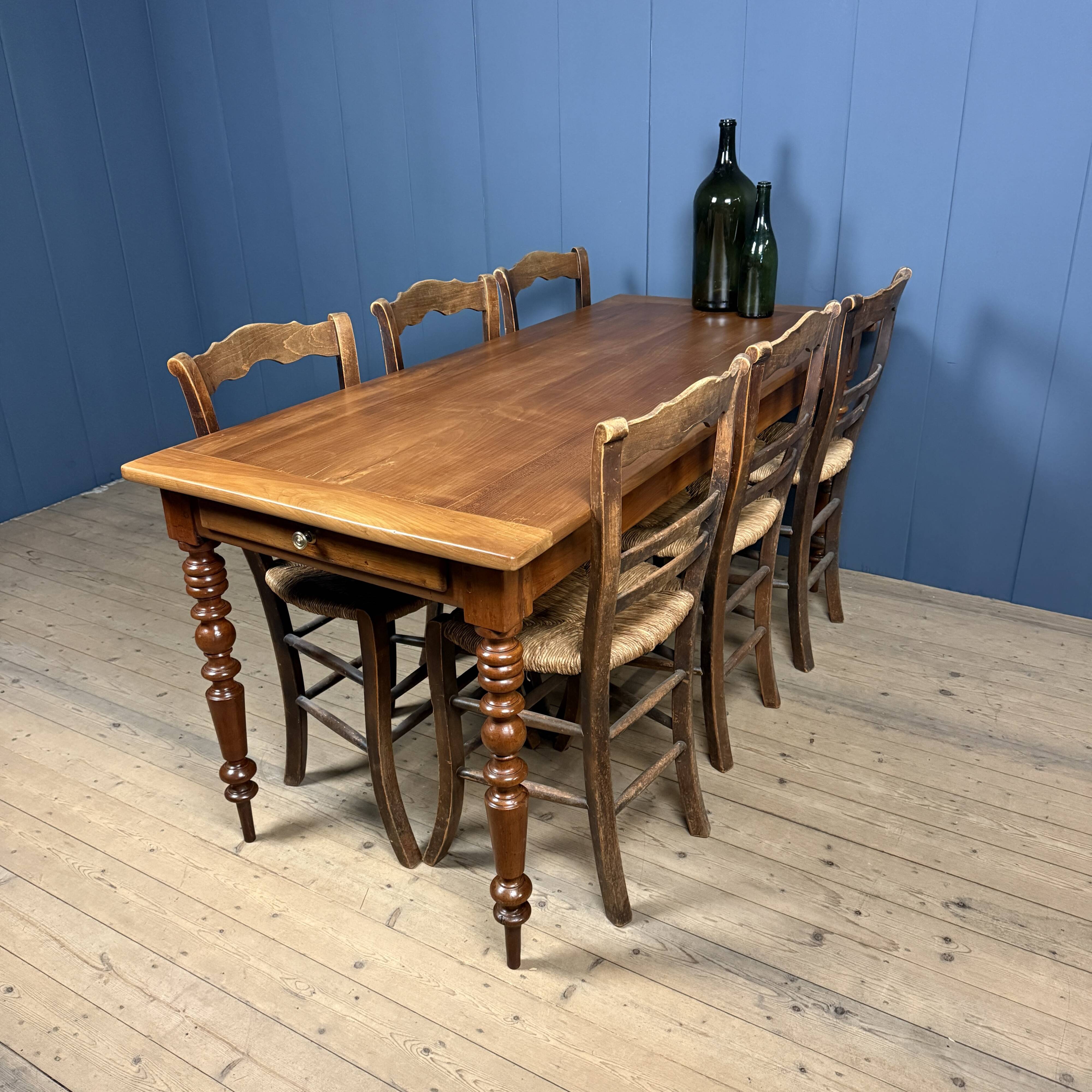Antique cherry wood dining table from France.