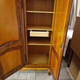 Wooden style wardrobe, 3 doors and 9 internal shelves.