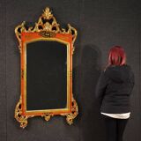 Miroir toscan laqué et doré du XXe siècle