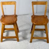 Pair of brutalist wooden back stools. France, circa 1960