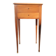 Nightstand with veneer and 4 drawers.