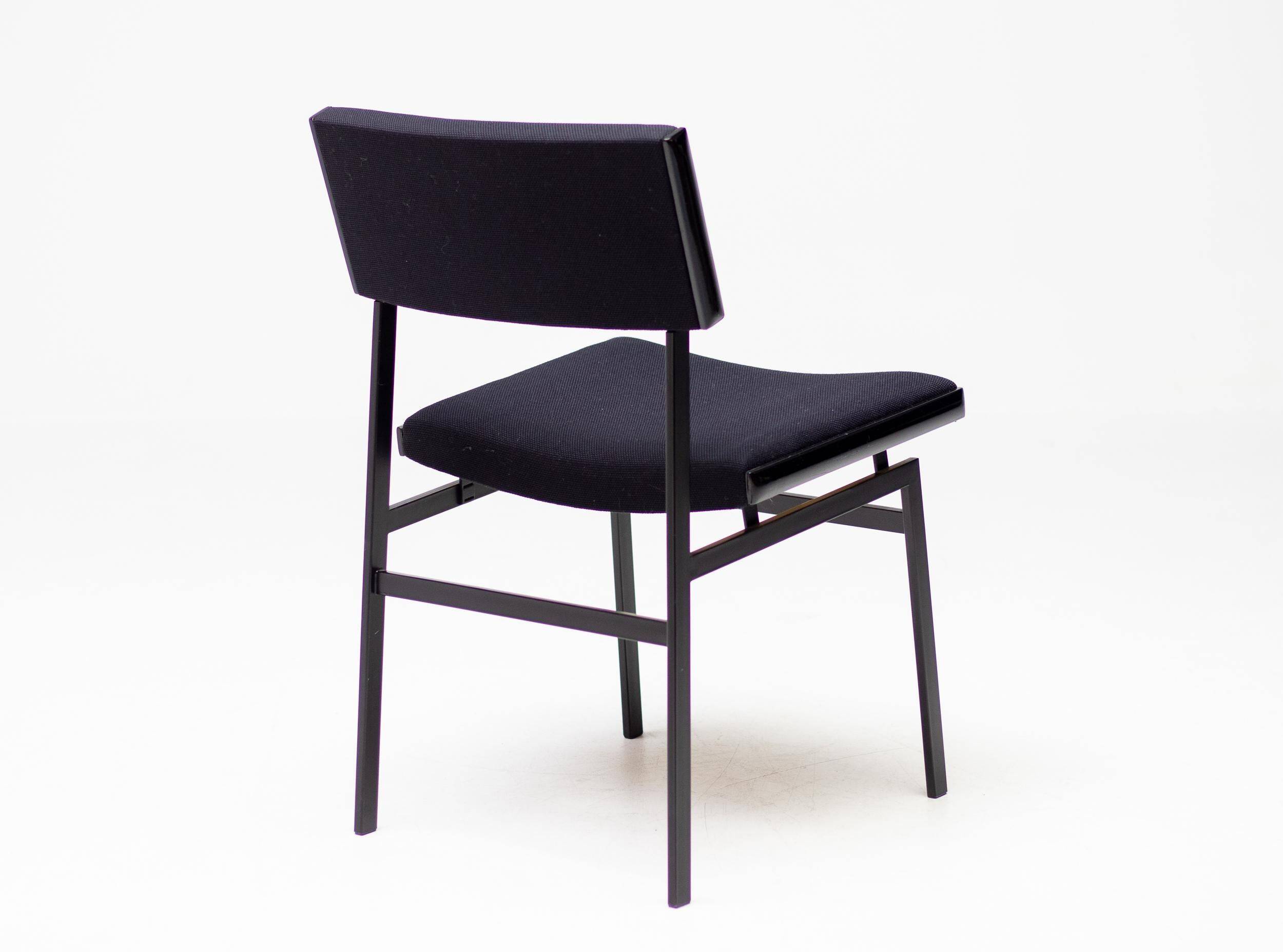 Set of four entirely black Hulmefa dining chairs, Architectural Modernism.
