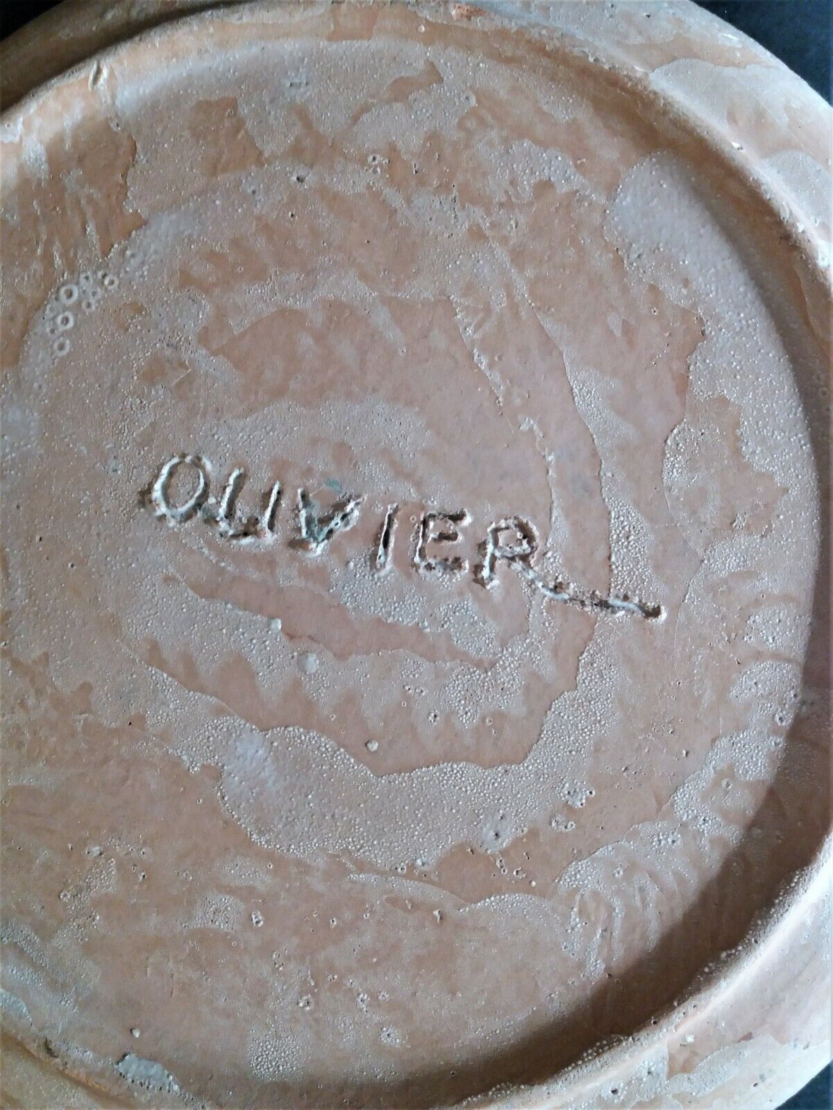 Vintage glazed terracotta ceramic plate signed Olivier