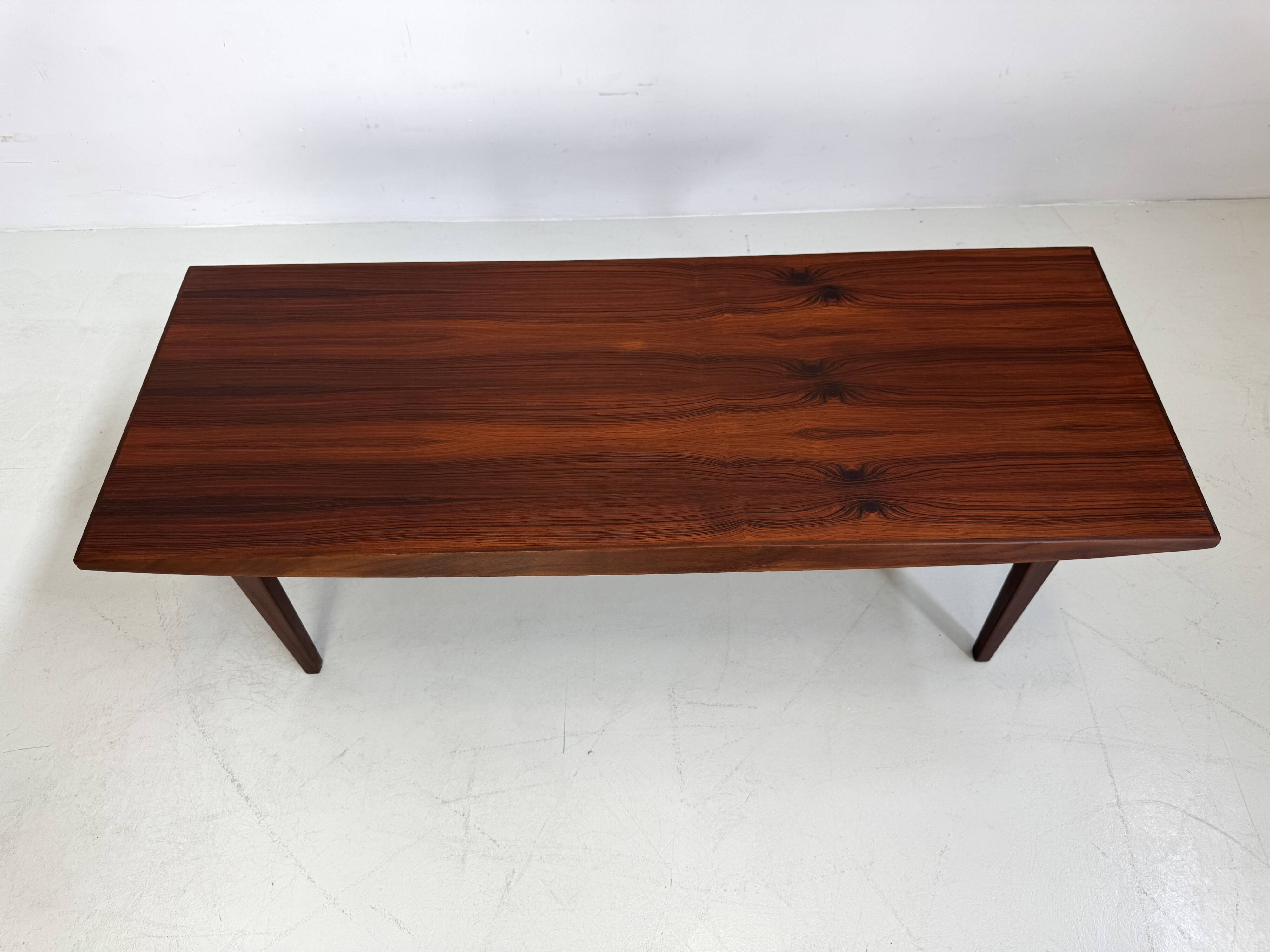 Beautiful compact design coffee table made of rosewood from the 1960s.