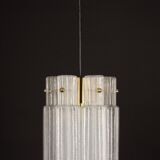 Pendant light with hand-blown glass pieces on a brass base made by Glashütte Limburg.