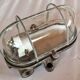 Pair of oval porthole wall lights in bakelite and glass