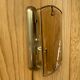 Brass wall lamp and smoked glass