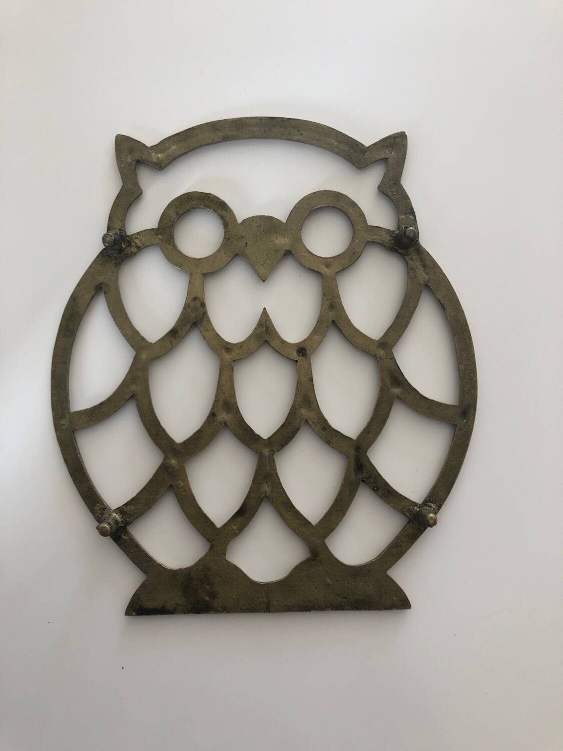 Old gold owl owl trivet in brass