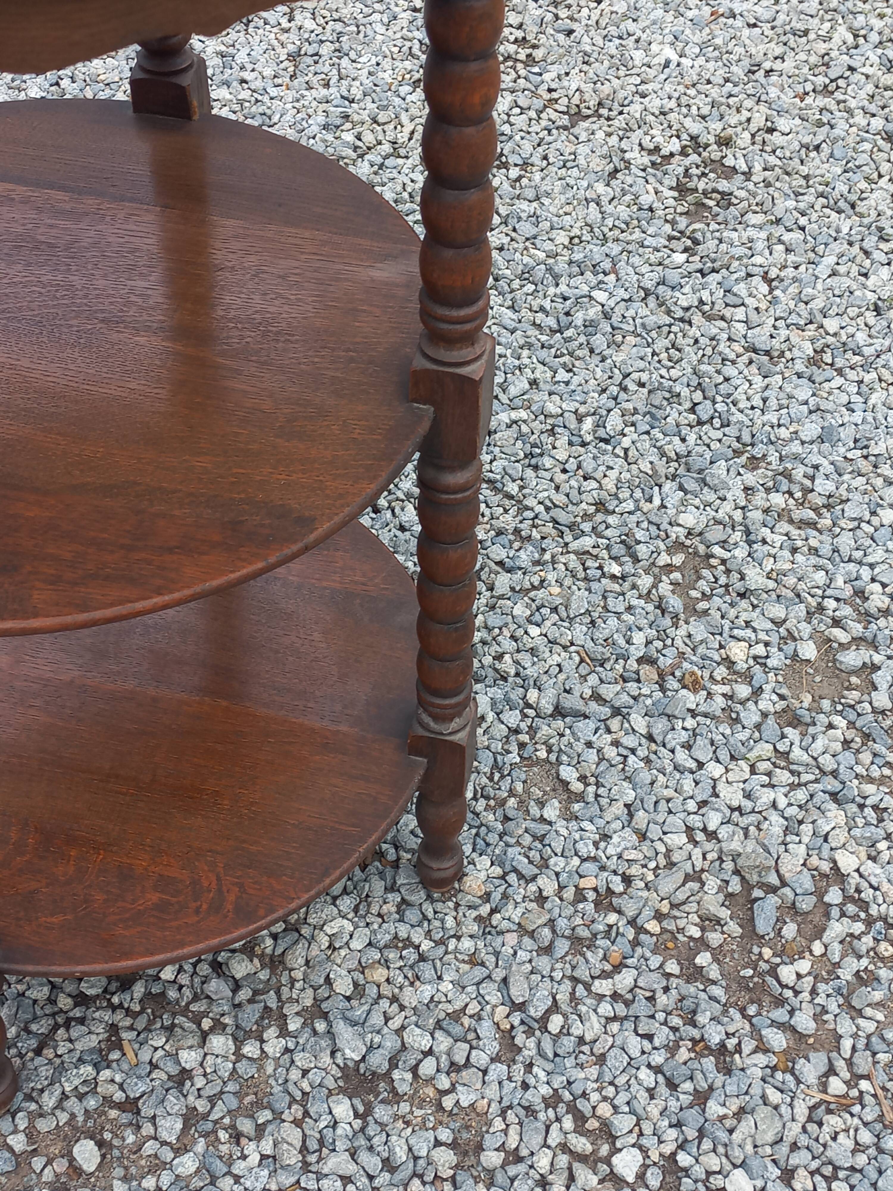 Vintage oak pedestal table with 3 shelves from the 60s
