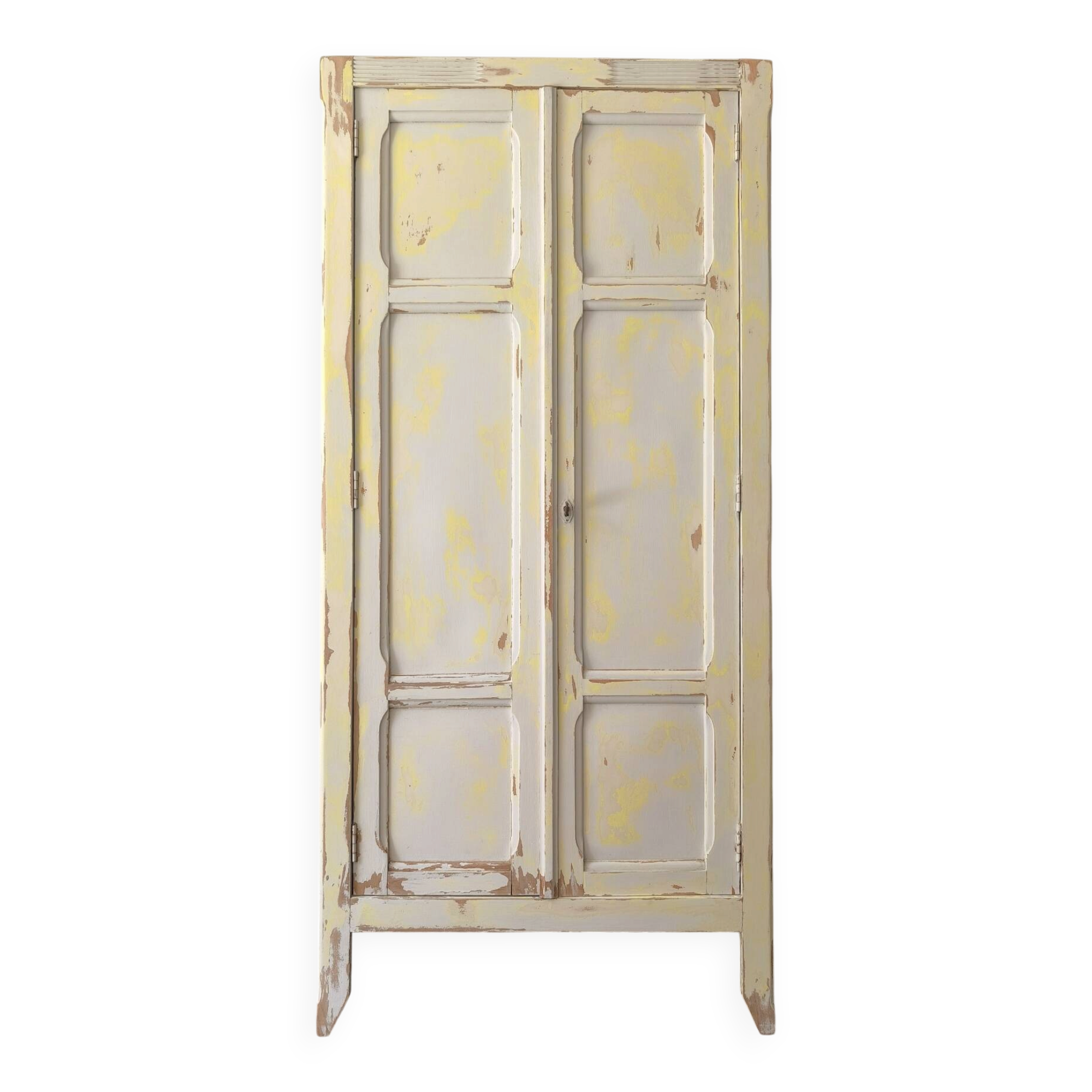 Small antique wardrobe patinated in beige and yellow.