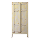 Small antique wardrobe patinated in beige and yellow.