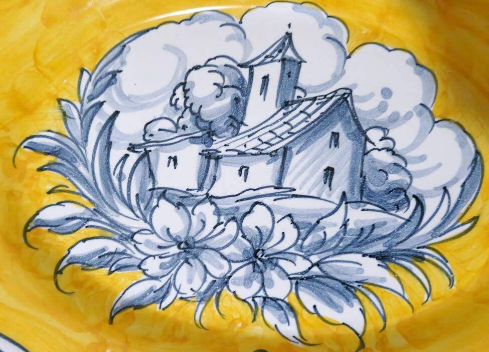 Pair of oval dishes in hand-painted faience with an Italian majolica spirit.