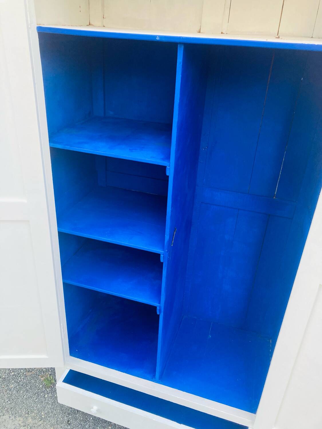 Antique white Parisian wardrobe with Majorelle blue interior