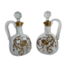 Pair of decanters, Cristallerie Baccarat, white crystal, painted in fine gold, Art Nouveau, 1900