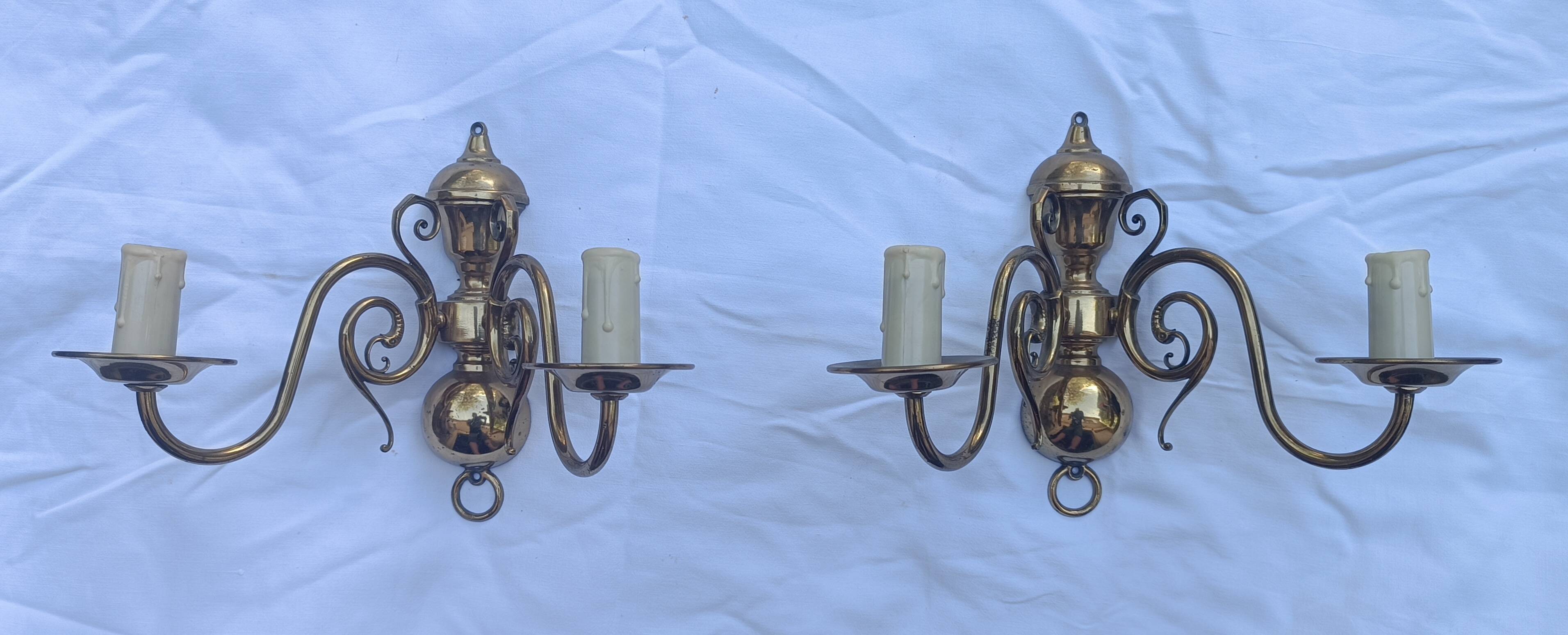 Pair of wall sconces in gilded brass